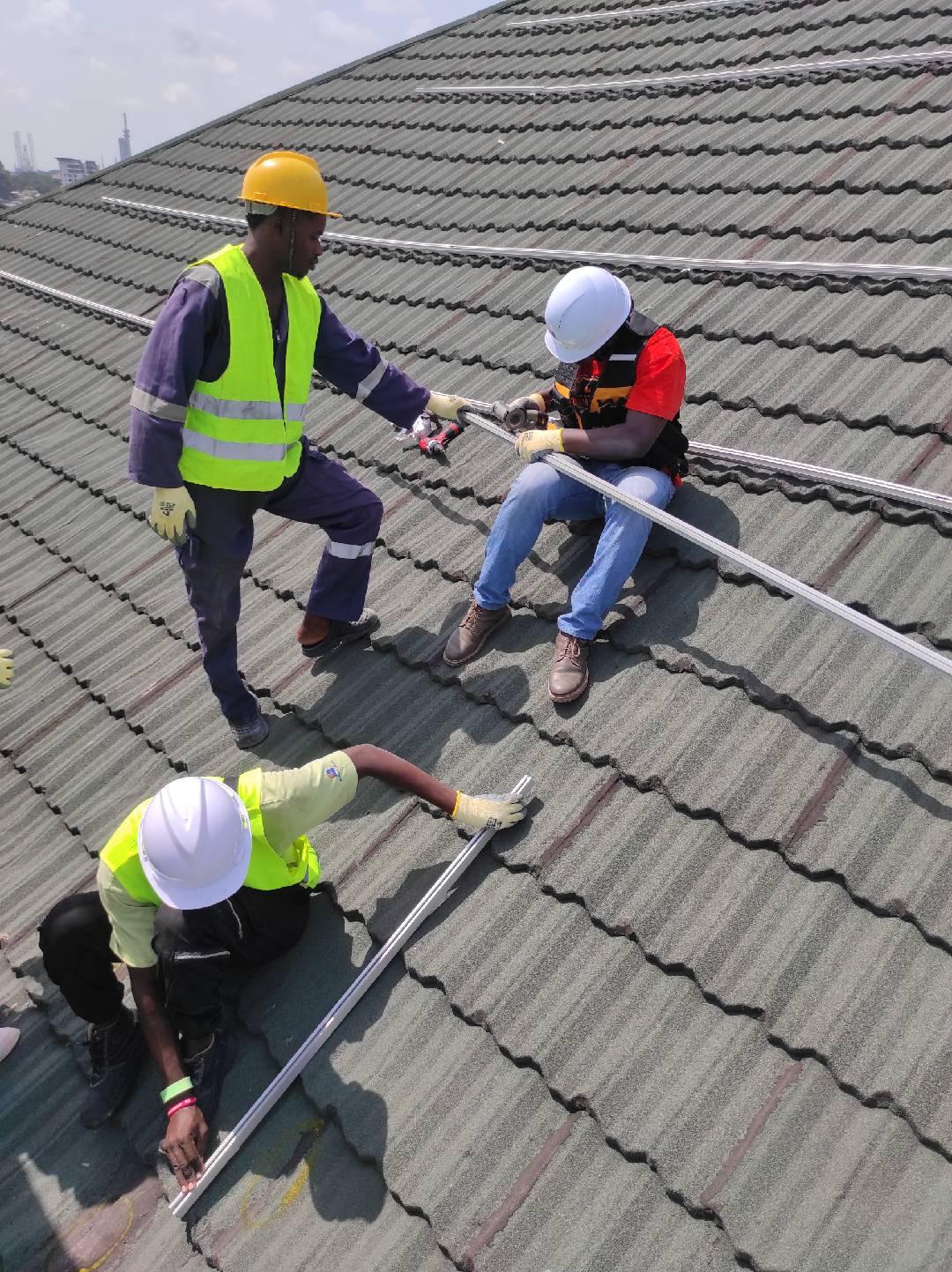 Blazing Trail Engineering crew mounting a rooftop solar array